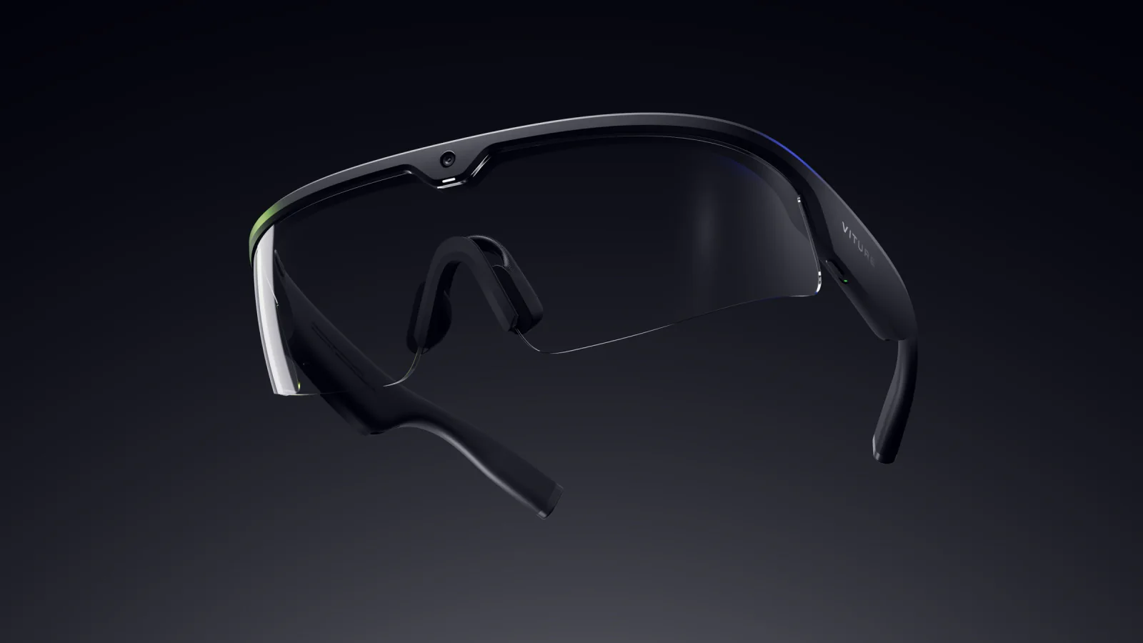 PIN safety glasses, three-quarter view: the clear lens, the camera in the brow and the capture light beside it